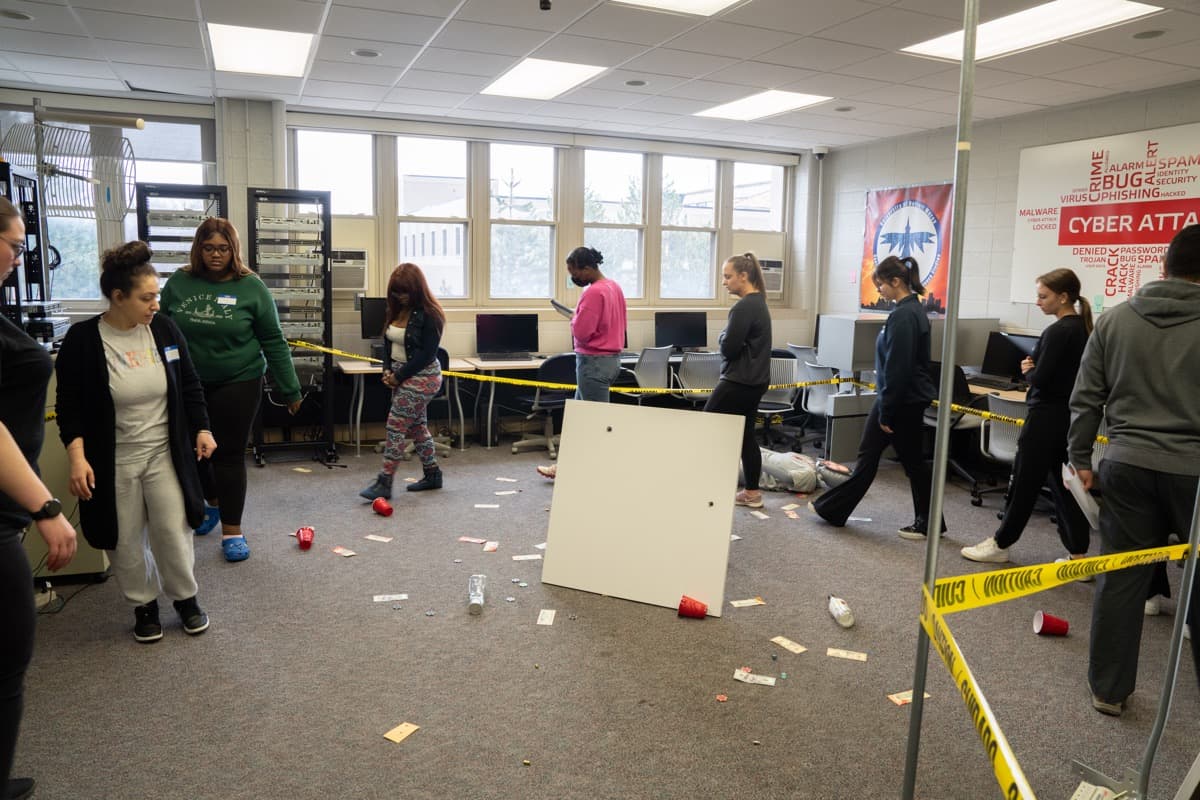 Group of students mapping out a crime scene